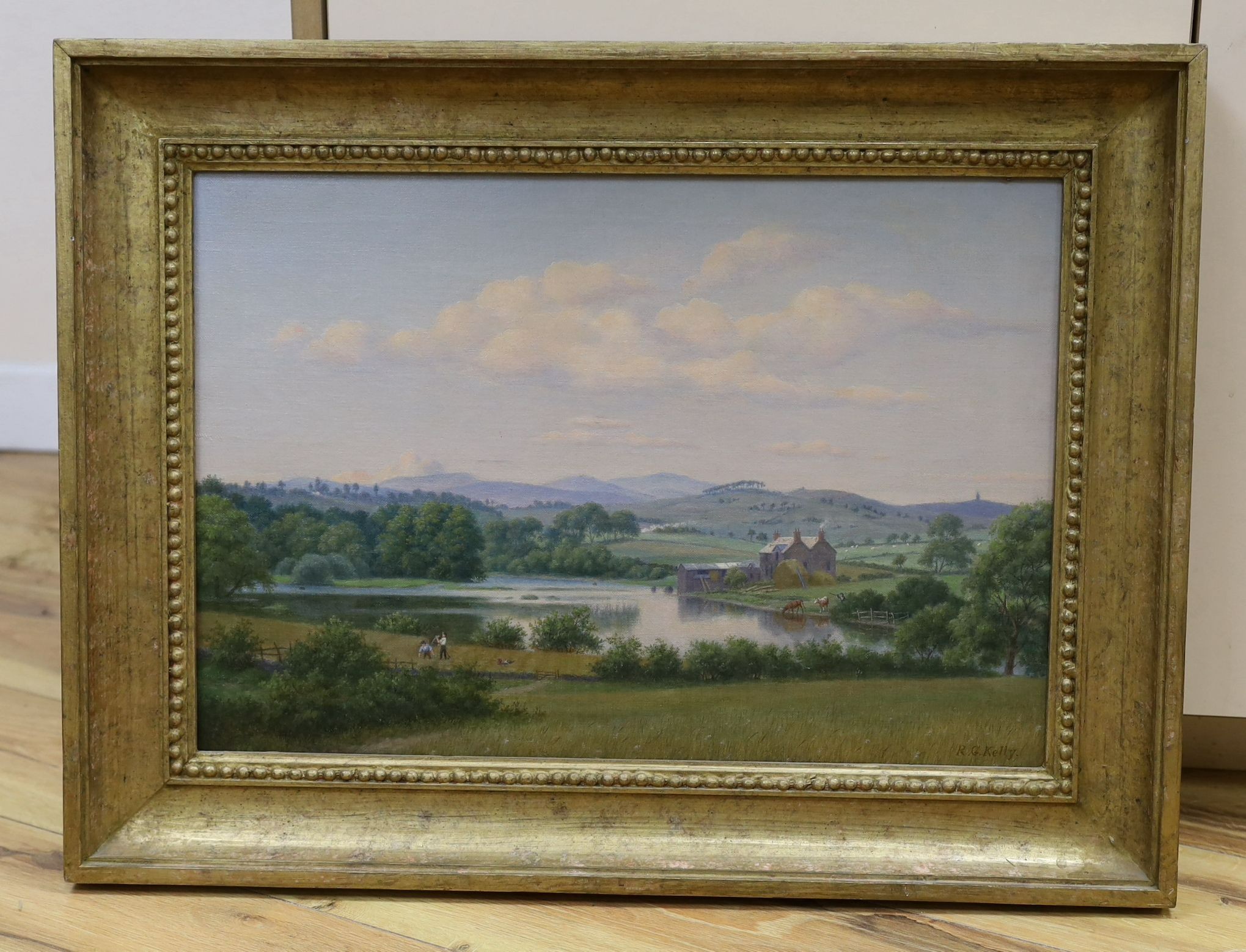 RG Kelly (20th C.), oil on canvas, Extensive landscape with harvesters and cattle watering, signed, 34 x 50cm
